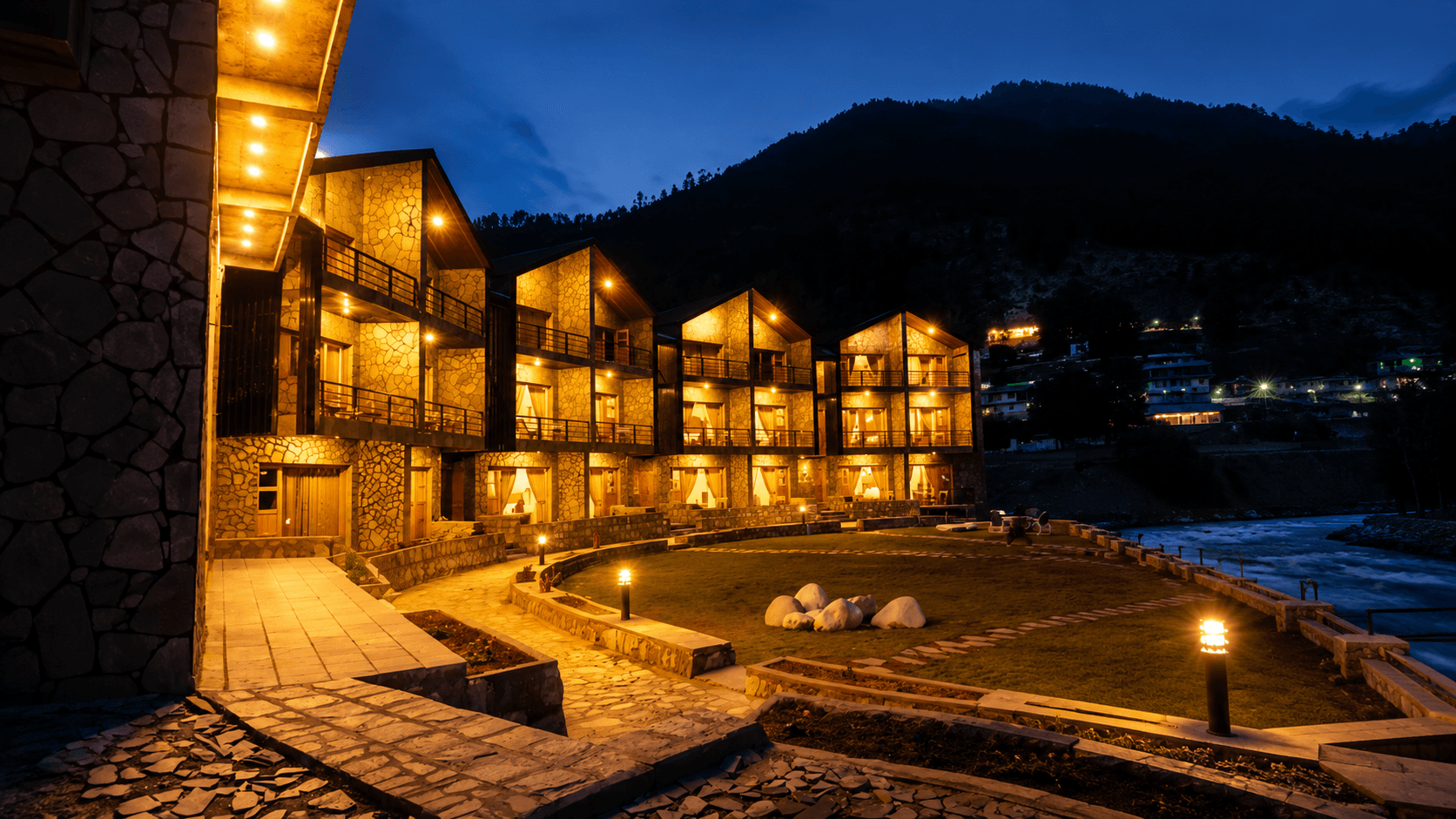 Greystone Lodge Kalam at blue hour, riverside mountain view