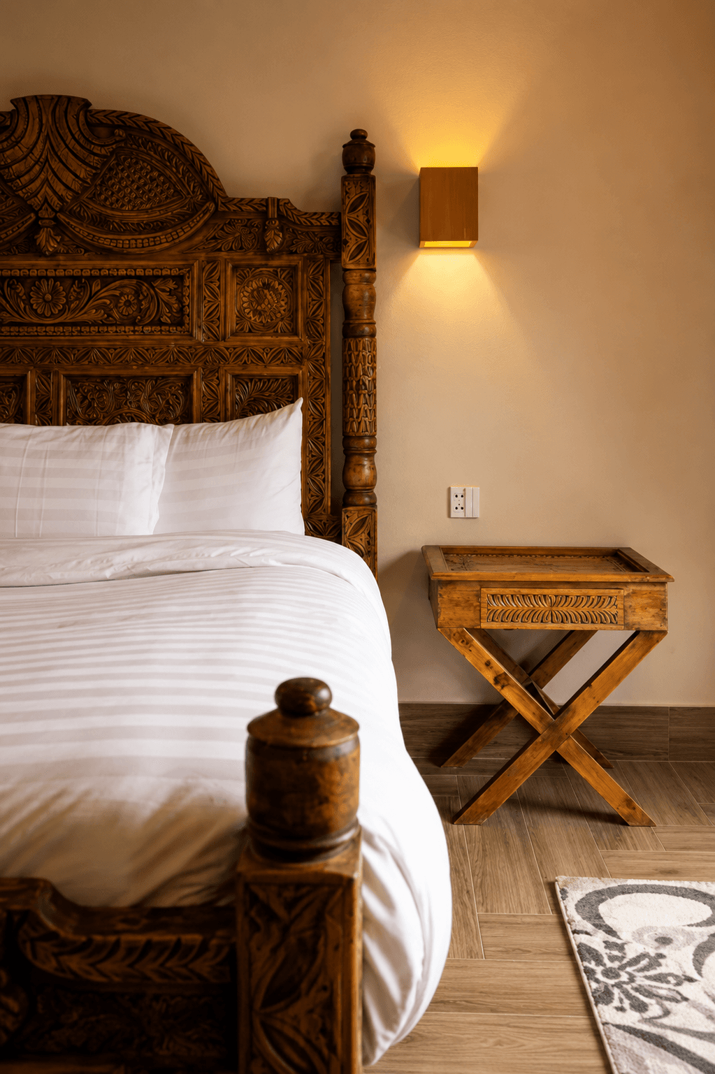 Bed detail in a Greystone Lodge room